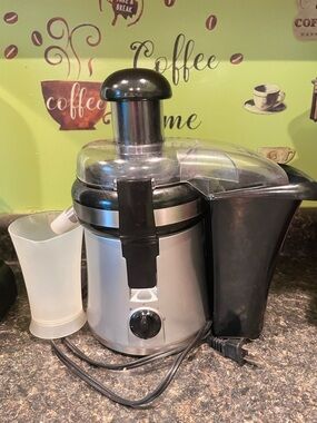 Stainless Silver and Black Electric Juice Extractor - Compact Kitchen Juicer